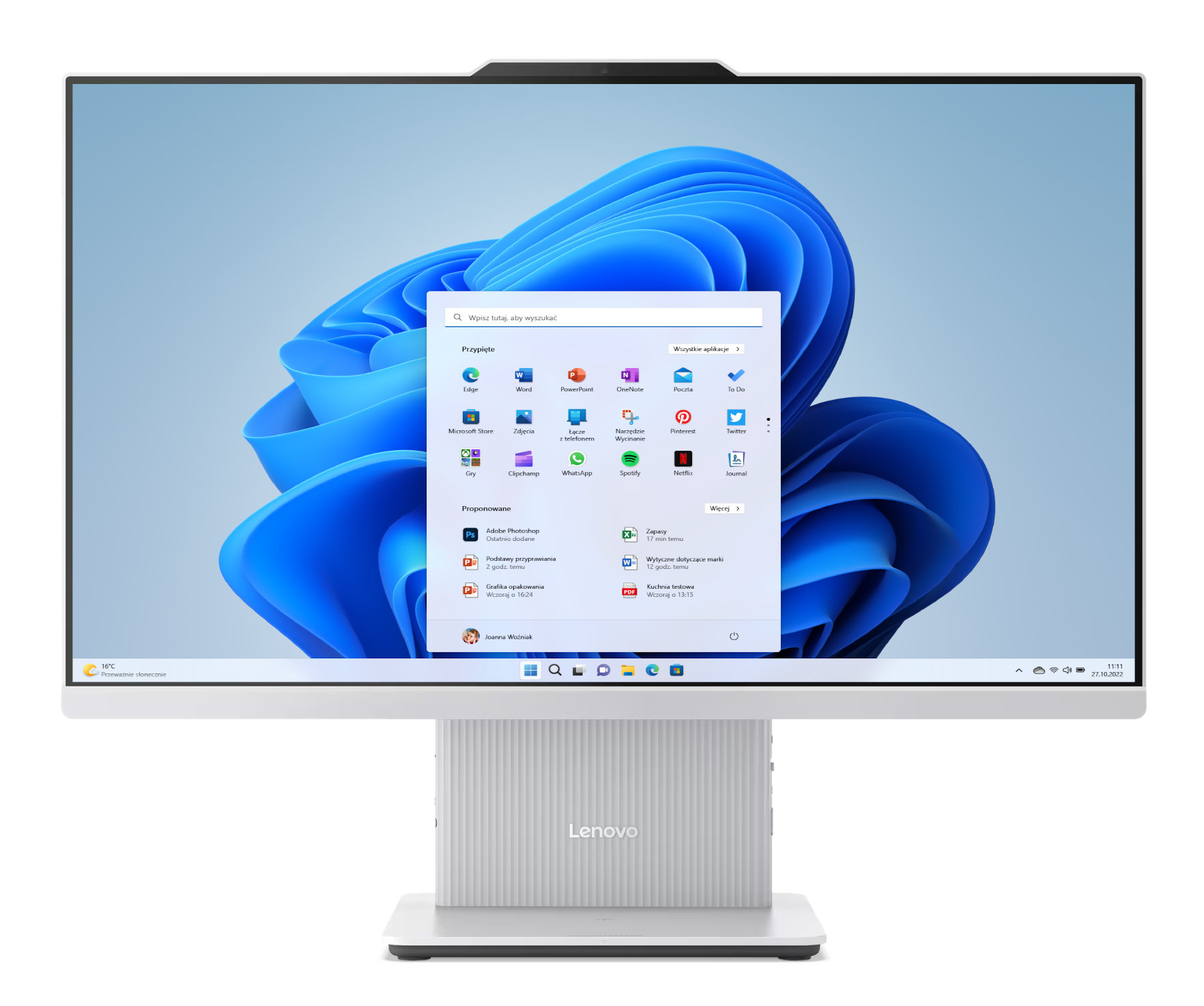 Komputer stacjonarny Lenovo all-in-one z dużym ekranem wyświetlającym interfejs Windows 11.