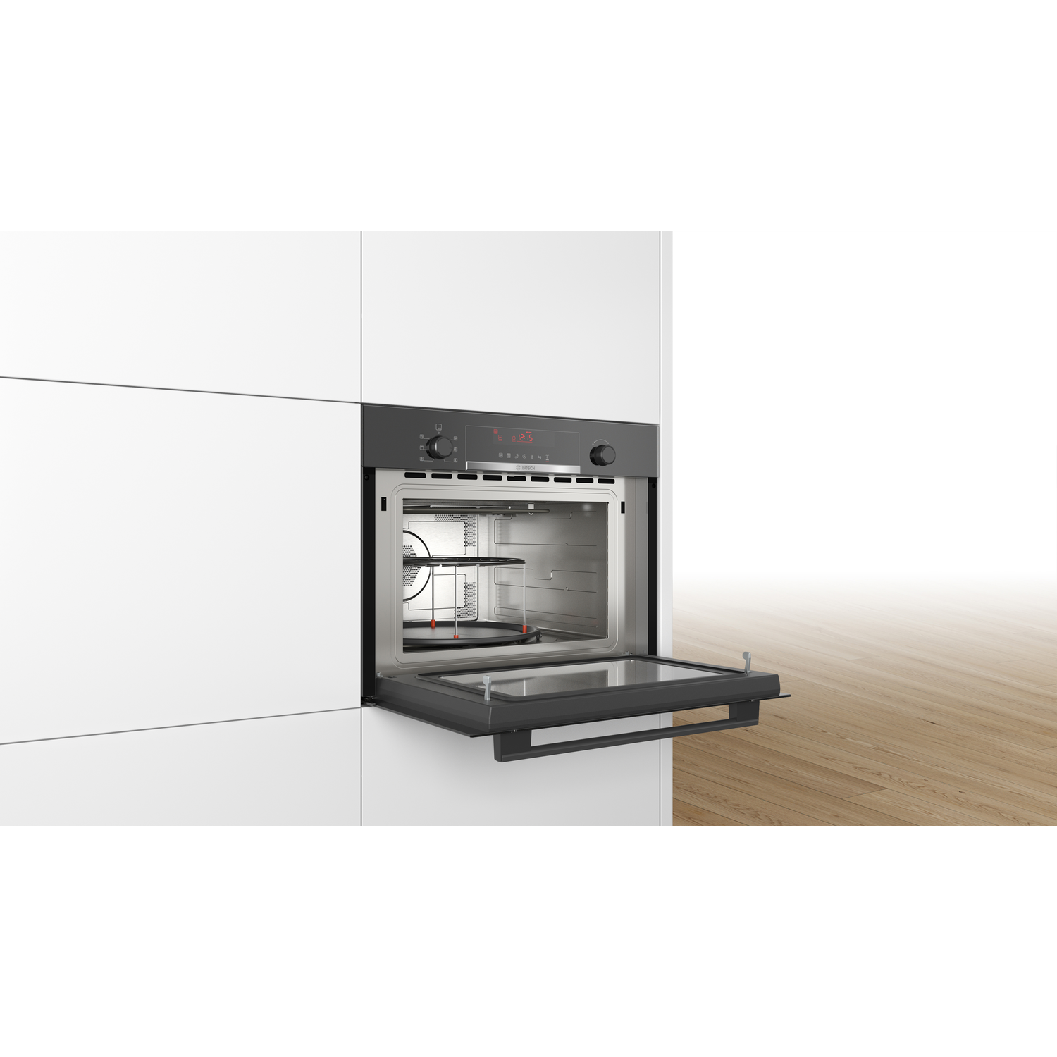 An open, black microwave oven. Inside, there is a rack and a tray. The door is open. The background is white and wooden.
