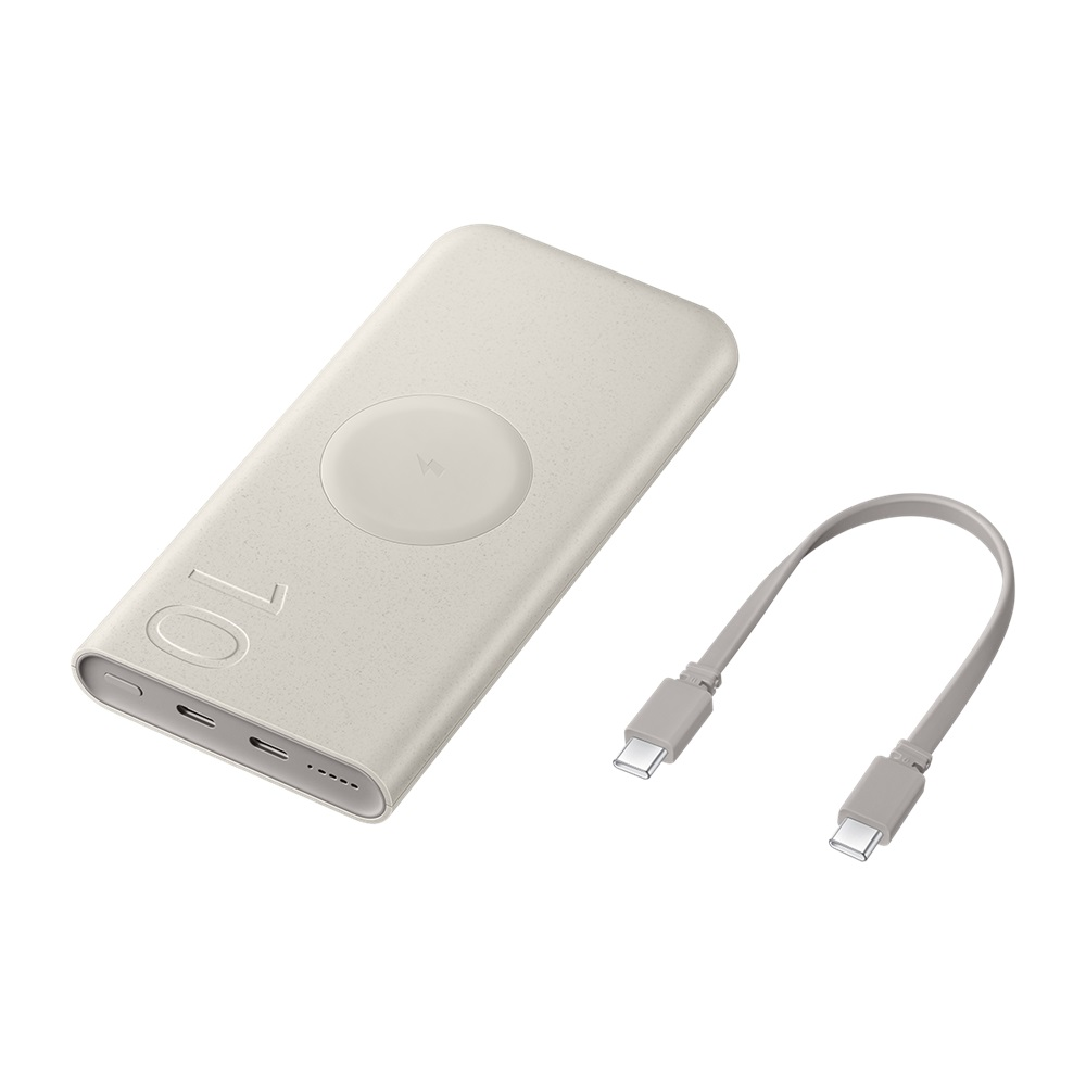 USB portları ve kablosuz şarj pedi olan bej taşınabilir şarj cihazı.