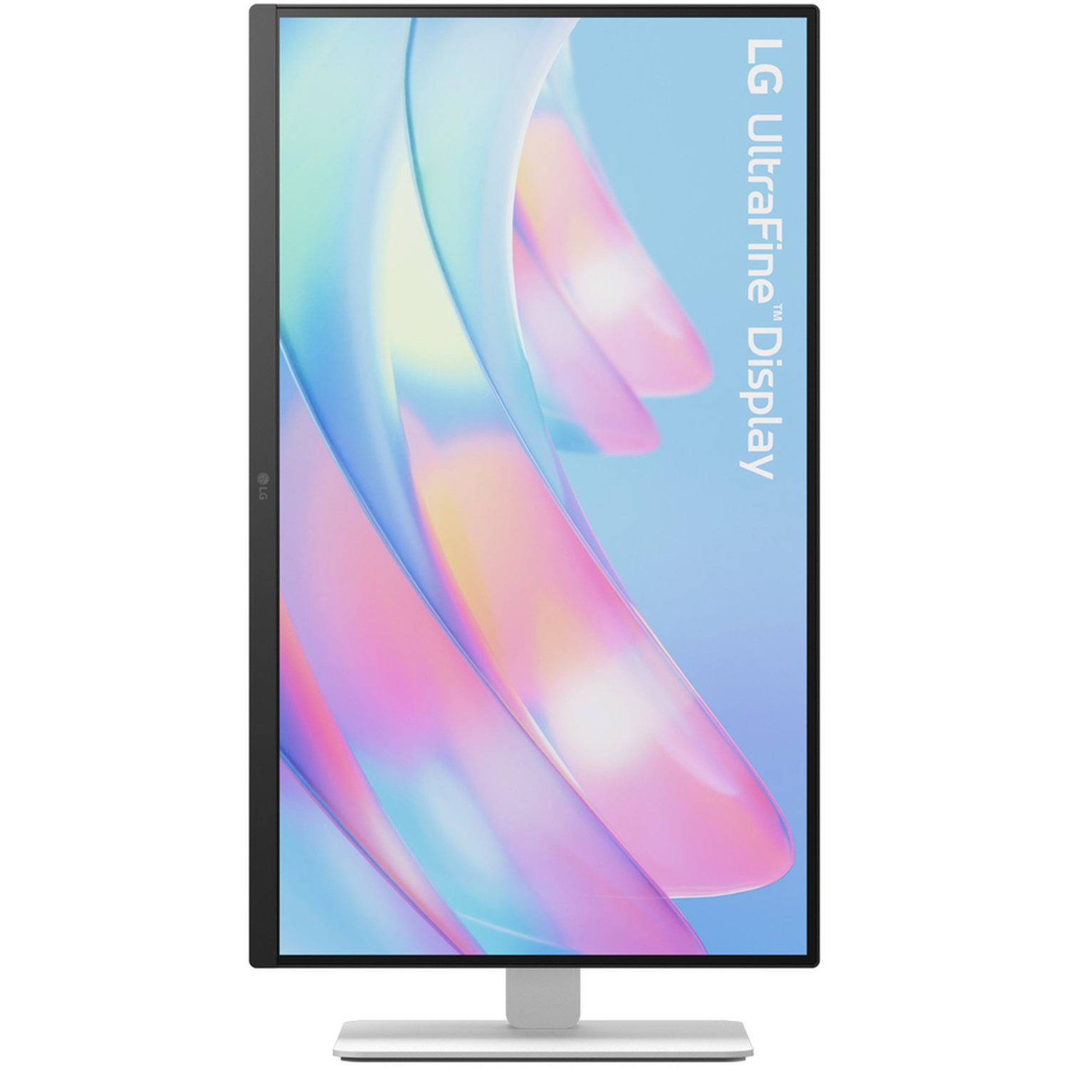 An LG UltraFine Display monitor. The screen shows colorful abstract shapes. The stand and frame are silver and black.