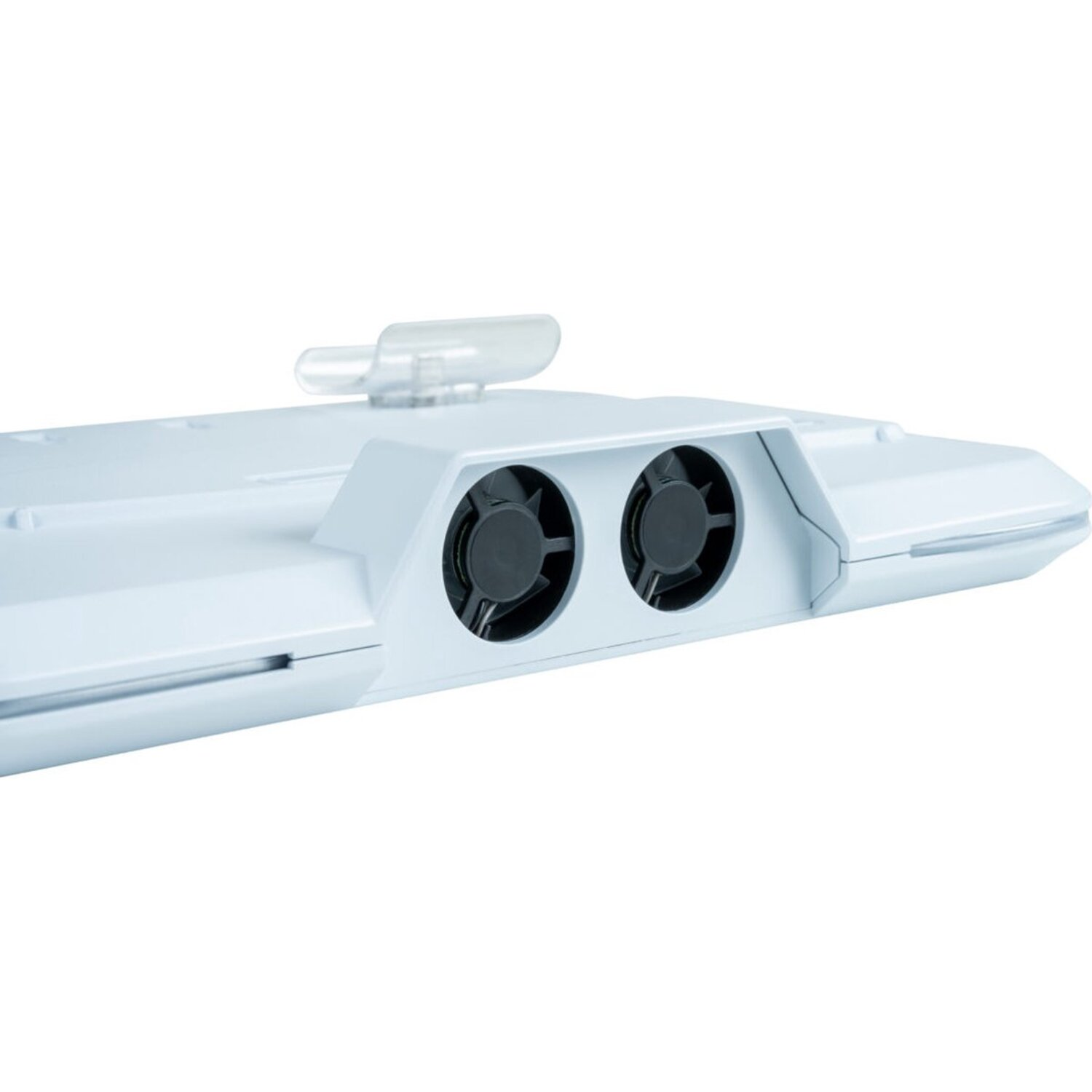 Close-up of a white device with two black fans. It is a part of a console.