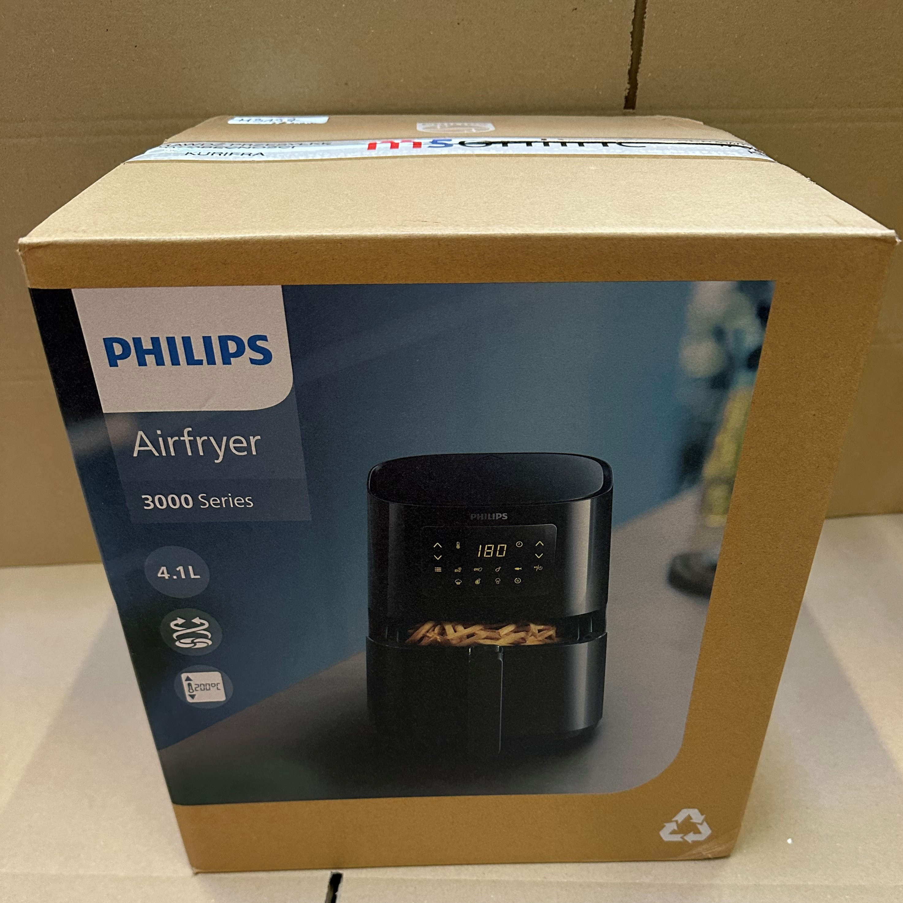Zapakowany Philips Airfryer serii 3000. Czarna frytkownica w pudełku.