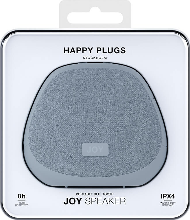 Haut-parleur Happy Plugs Joy dans un emballage. Haut-parleur gris, cadre noir. Fond blanc.