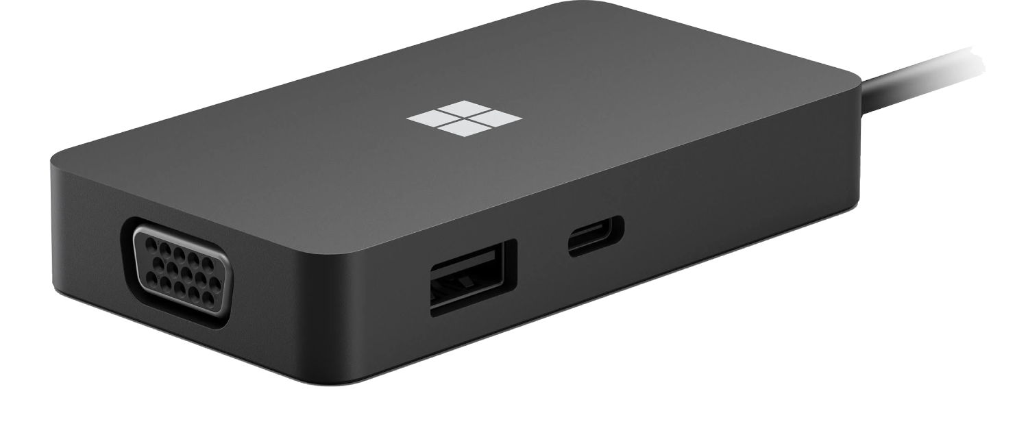 Base de conexión negra de Microsoft. Tiene puertos VGA, USB y USB-C. Logotipo de Microsoft arriba.