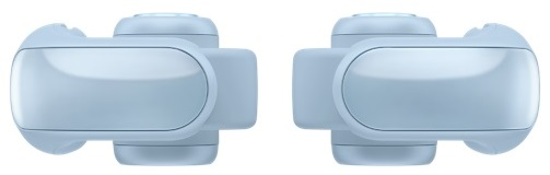 Dwa niebieskie aparaty słuchowe. Białe tło. Widok z góry.