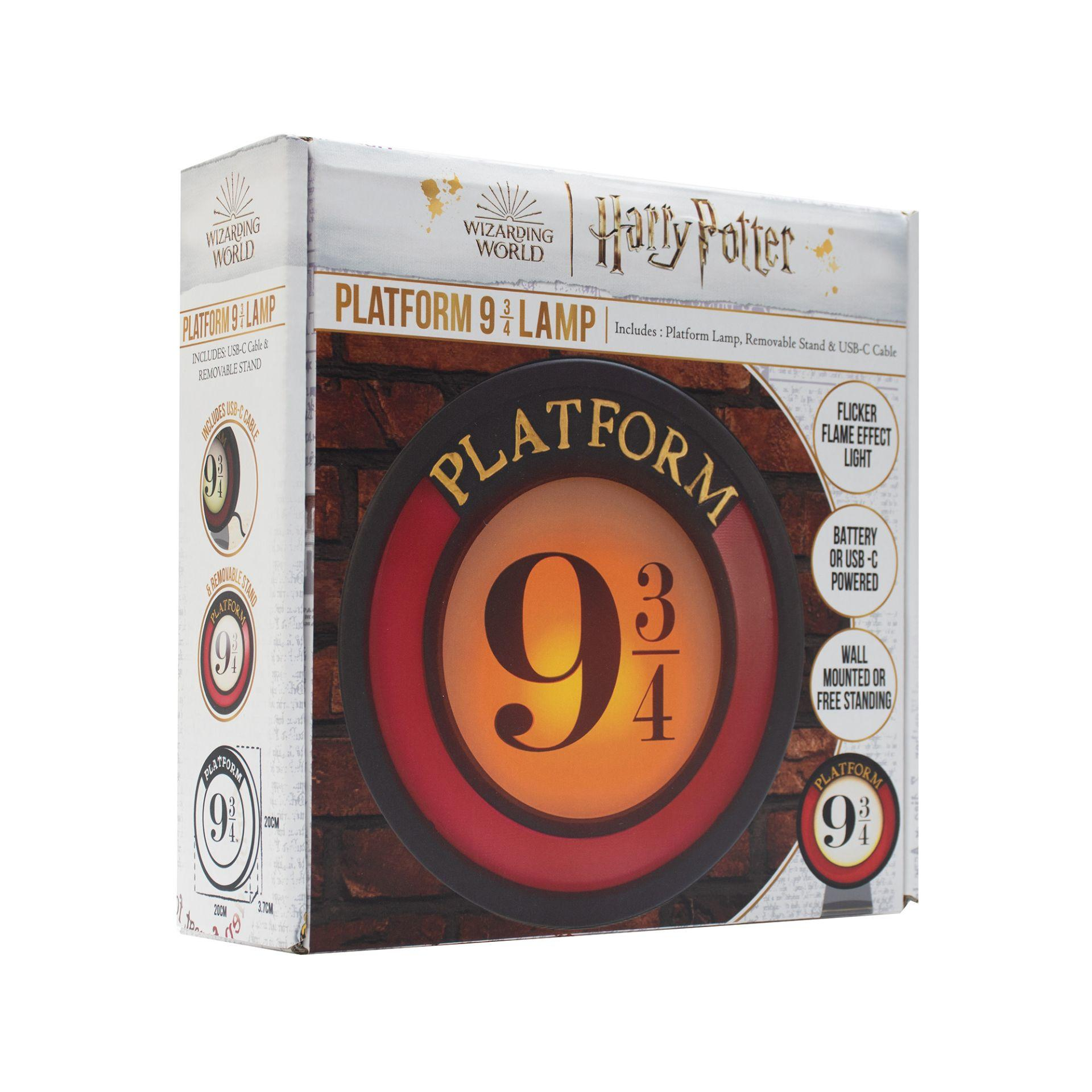 Box für eine Platform 9 3/4 Lampe, mit rotem und gelbem kreisförmigen Design und Text.