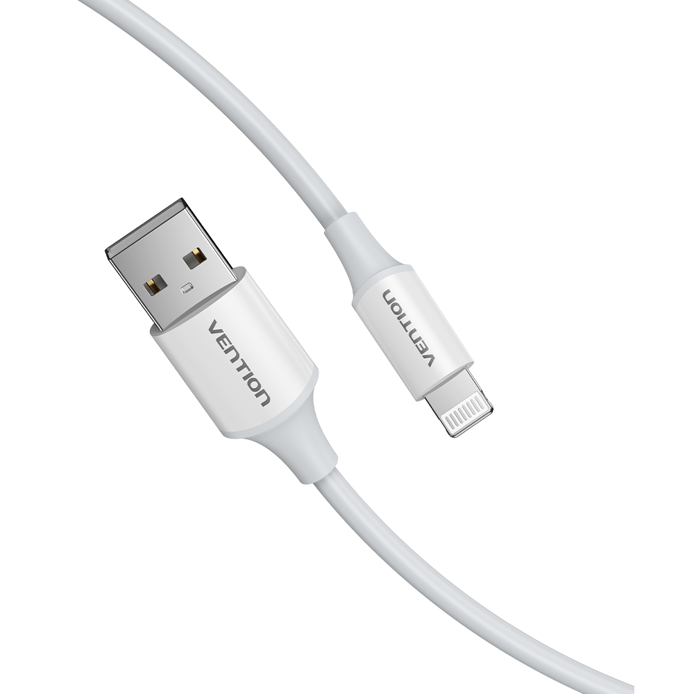 Fehér és ezüst USB-Lightning kábel fekete háttér előtt.