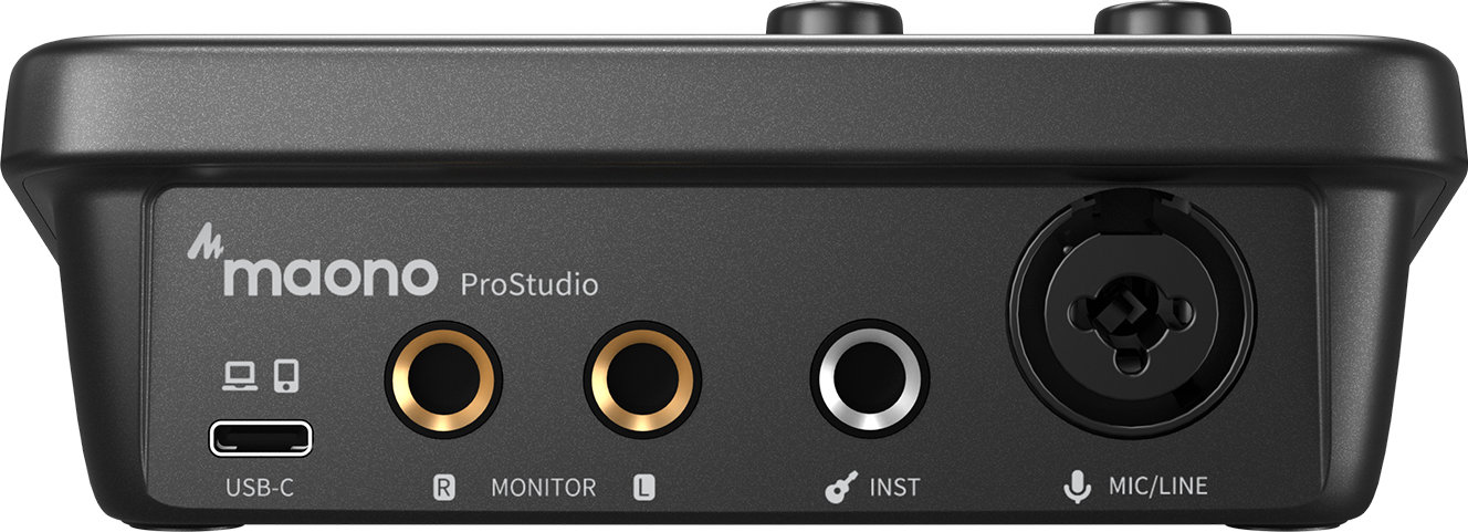 Interface audio noire avec plusieurs ports étiquetés pour les entrées.