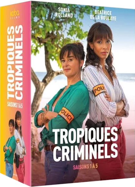 DVD-omslag: 'Tropiques Criminels' met twee vrouwen, tekst en een tropische achtergrond.