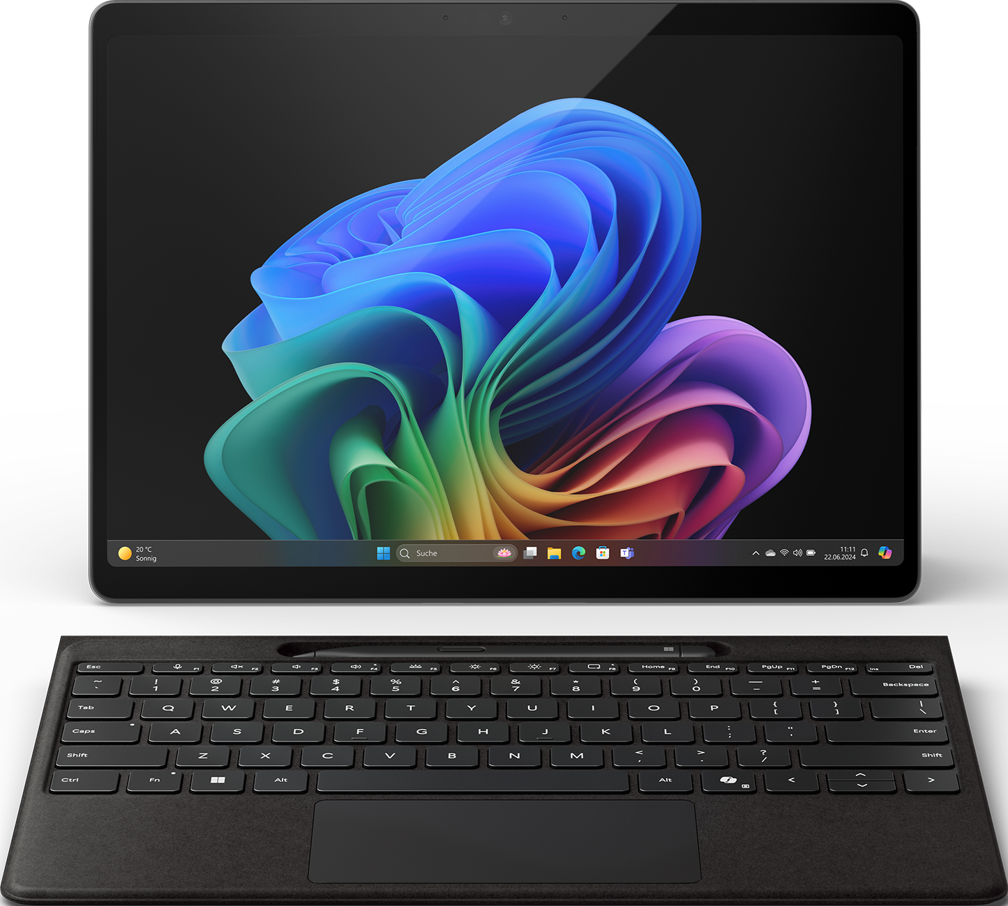 Ein Tablet und eine Tastatur. Das Tablet zeigt bunte abstrakte Formen.