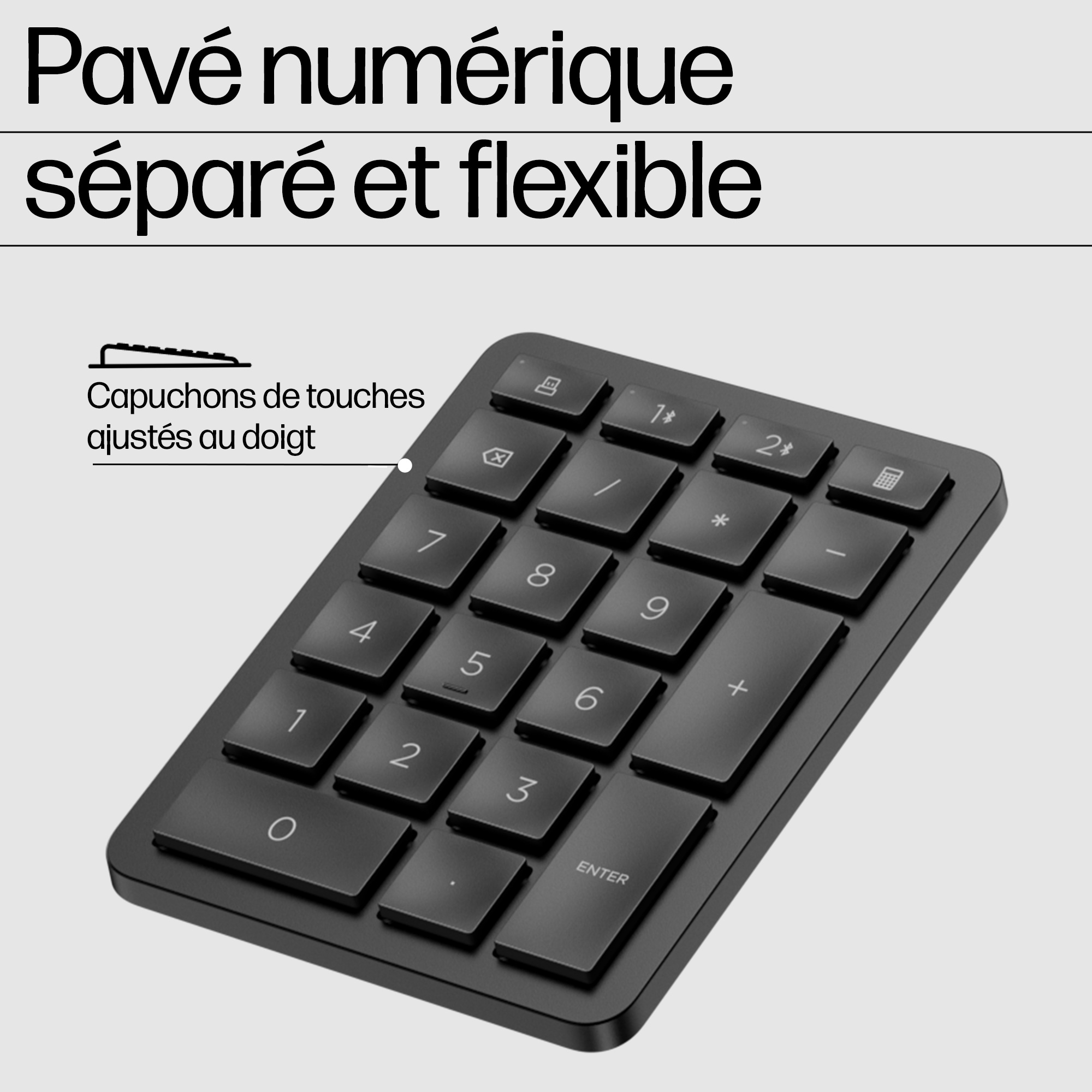 Clavier numérique noir au design moderne sur fond clair.
