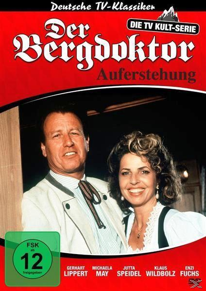 DVD-Hülle. Zwei lächelnde Personen auf rotem Hintergrund mit Text.