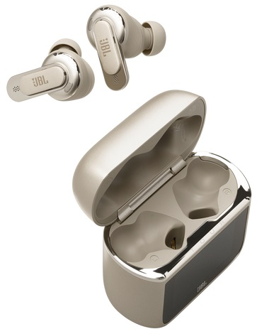 Beżowe słuchawki douszne JBL i etui ładujące. Widoczne są trzy słuchawki i etui. Pokrywa etui jest otwarta.