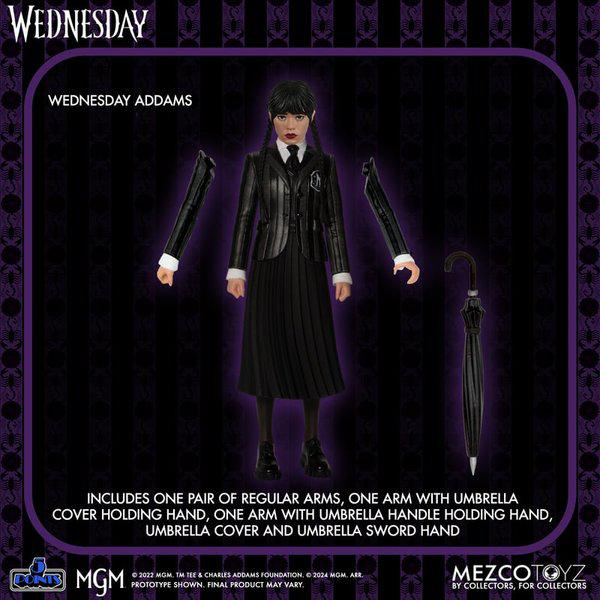 Eine Wednesday Addams-Sammelfigur, in der Box, mit Zubehör wie Armen, Händen und Regenschirm.