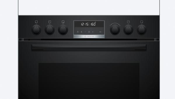 Schwarzer Backofen mit Digitalanzeige und Knöpfen.