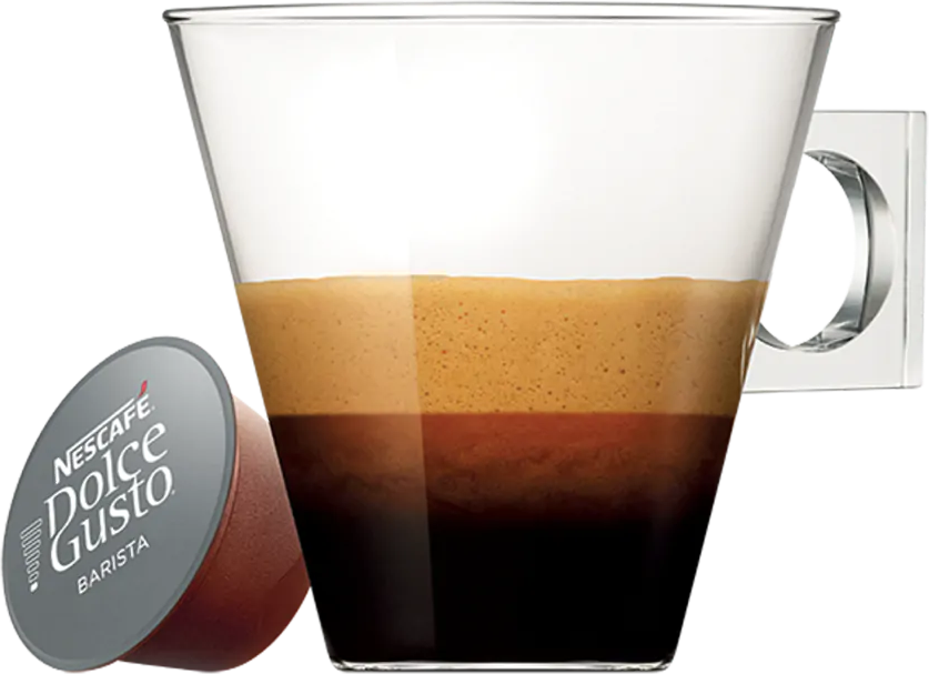 Una bevanda al caffè in un bicchiere trasparente con una cialda di caffè accanto.