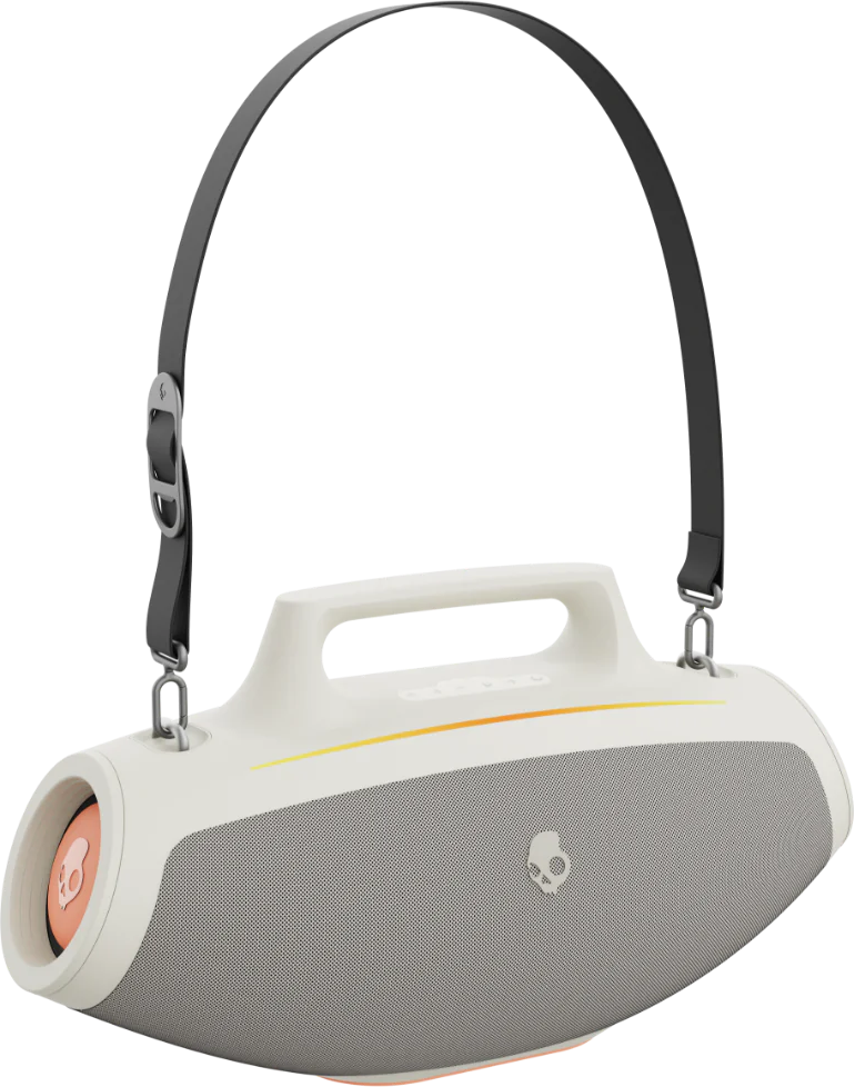Haut-parleur Skullcandy blanc et gris avec une sangle noire. Détail orange du haut-parleur.