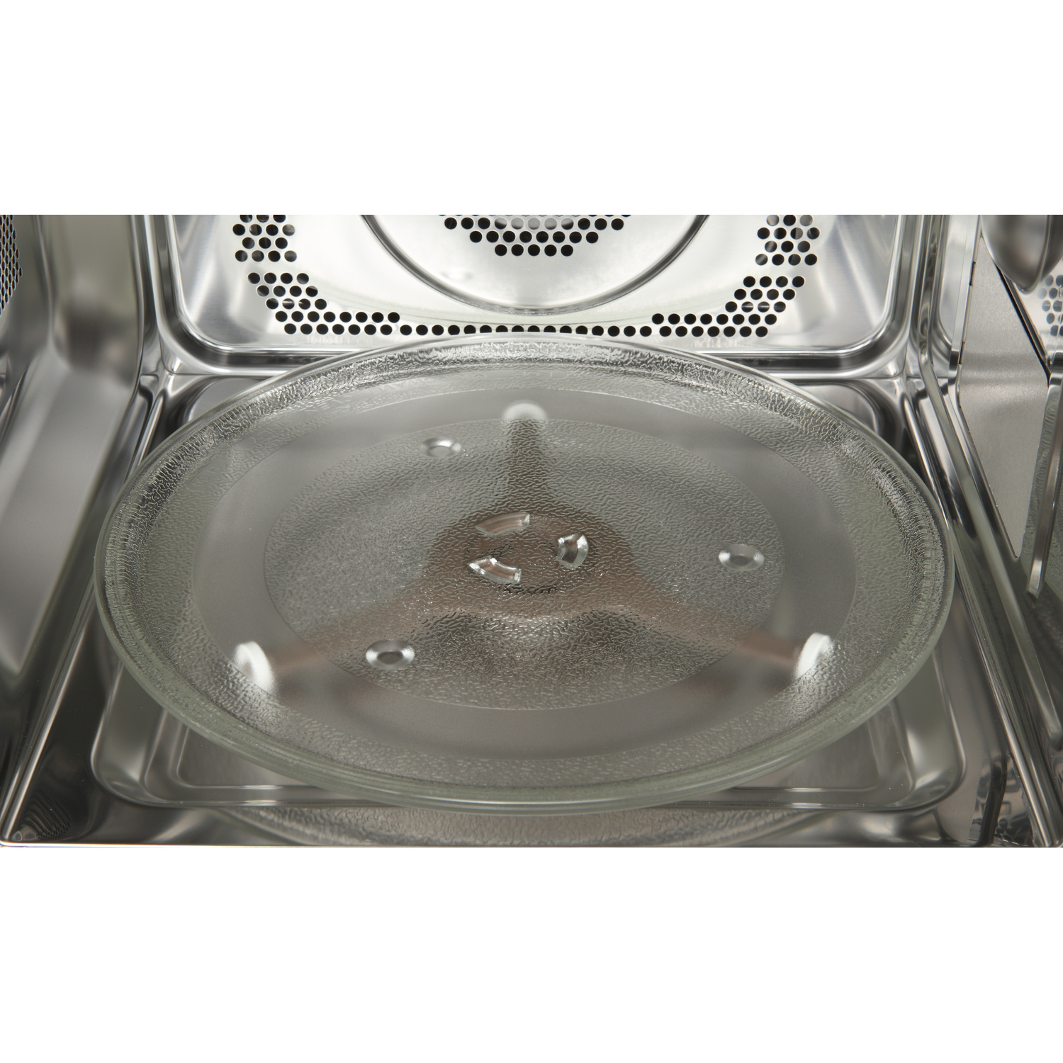 Microwave interior with a glass plate.