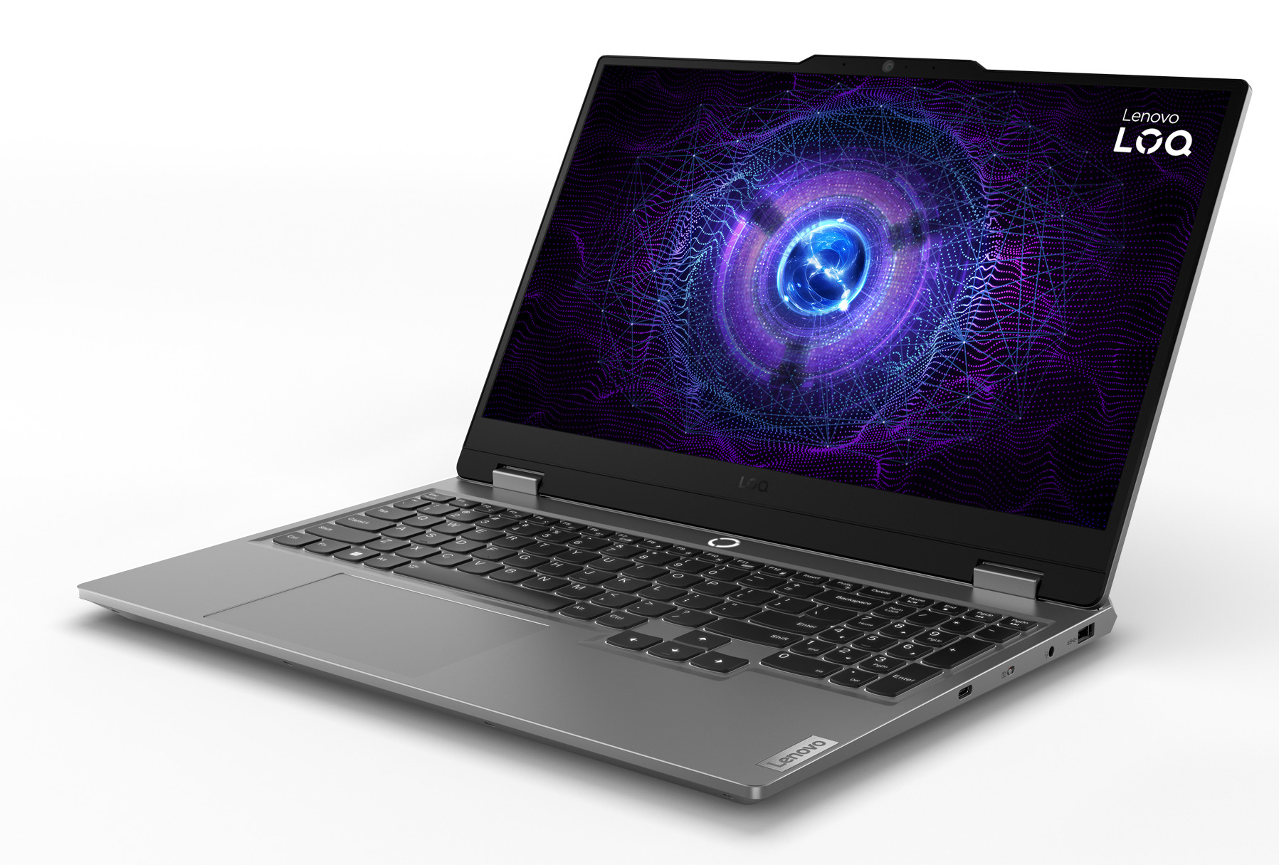 Laptop z otwartym ekranem. Ekran wyświetla kolorowy design. Klawiatura i touchpad są widoczne.