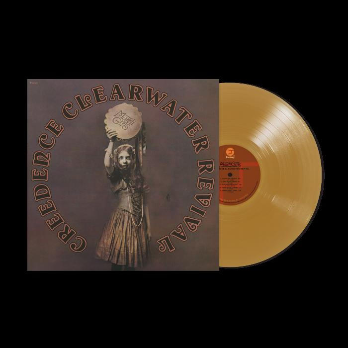 Albumhoes van een meisje met een trommel, en een vinylplaat op zwarte achtergrond.