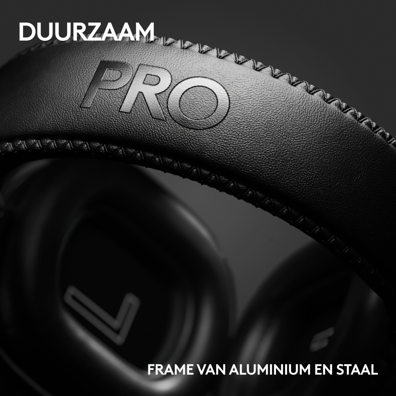 Close-up of black headphones, with 'PRO' embossed and frame text.