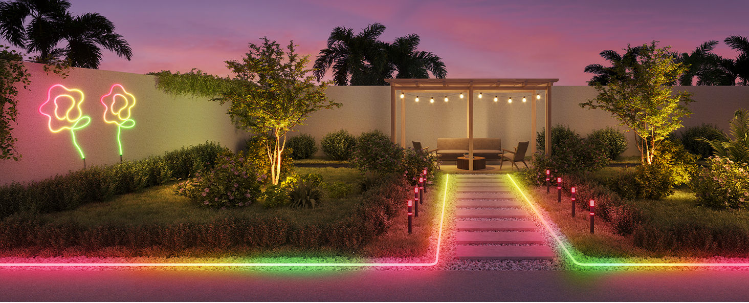 Eine Gartenszene mit Neonblumenlichtern und einer Pergola.