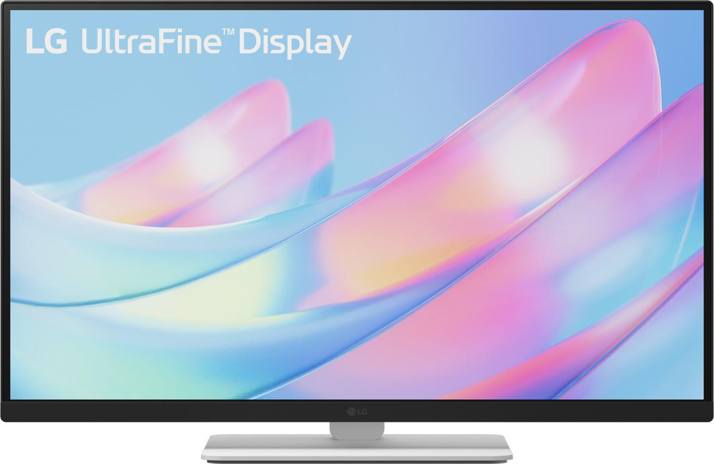 LG UltraFine Display. Anzeige zeigt abstrakte bunte Formen. Schwarzer Rahmen und Sockel.