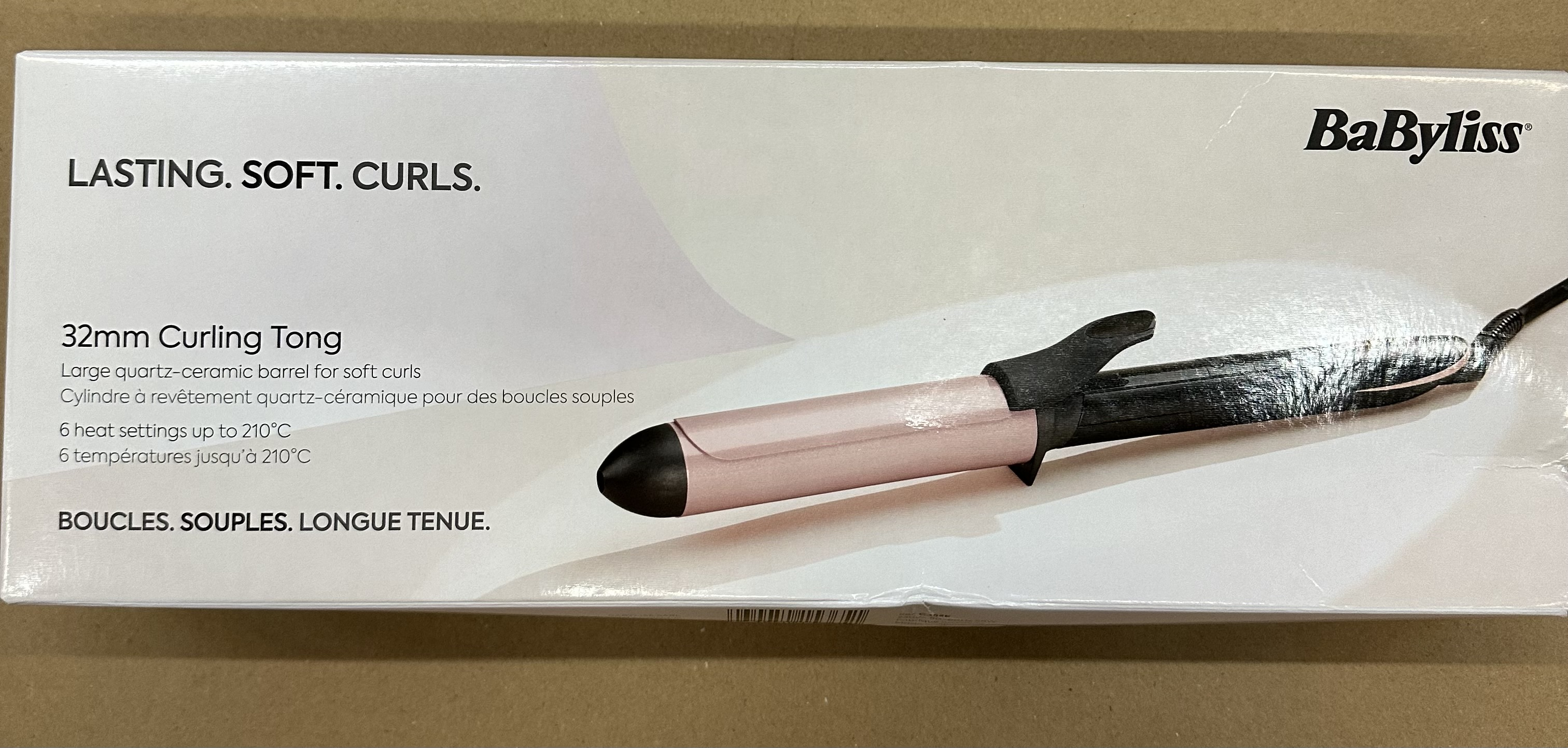 Pudełko do lokówki 32 mm, z tekstem i obrazami.