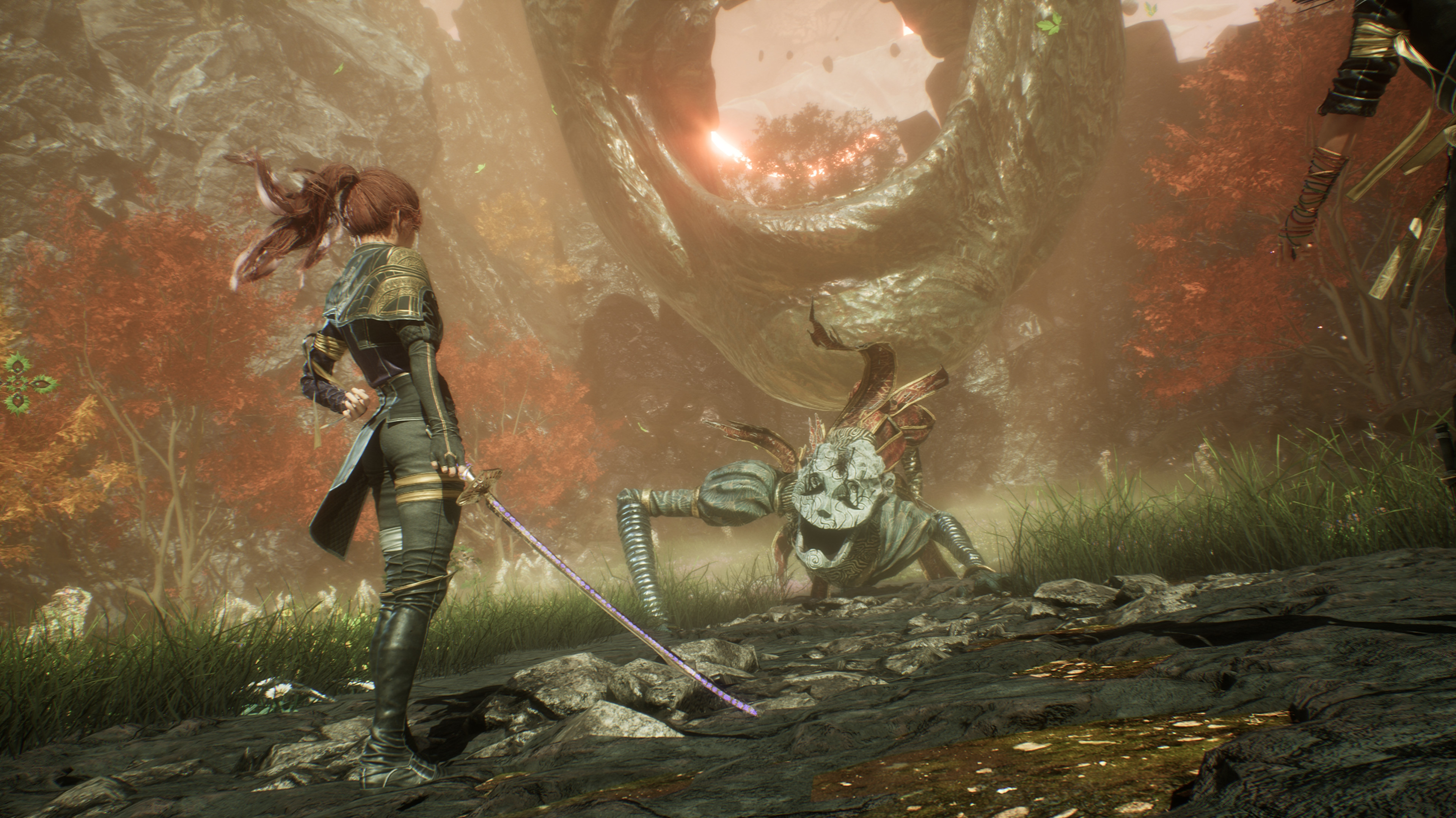 Kobieta z mieczem, naprzeciw potworowi w fantastycznym lesie.