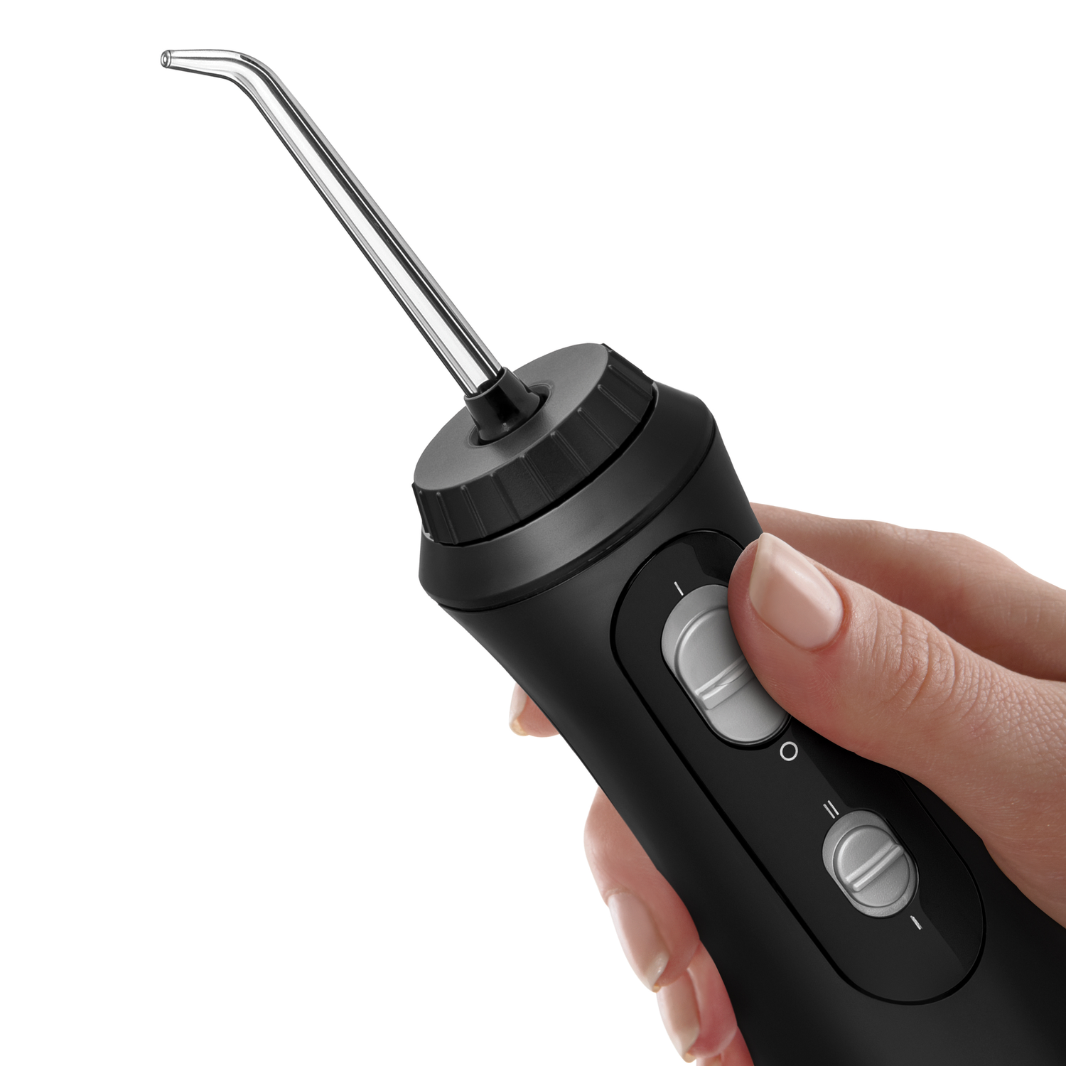 A black water flosser with a silver tip, held in a hand.