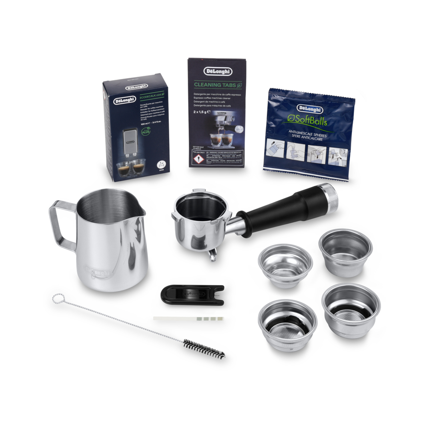 Coffee machine accessories: a frothing jug, cleaning supplies, and various filters.