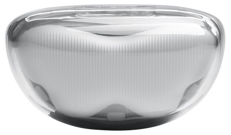 Przezroczysta, owalna plastikowa obudowa z białymi przedmiotami w środku.