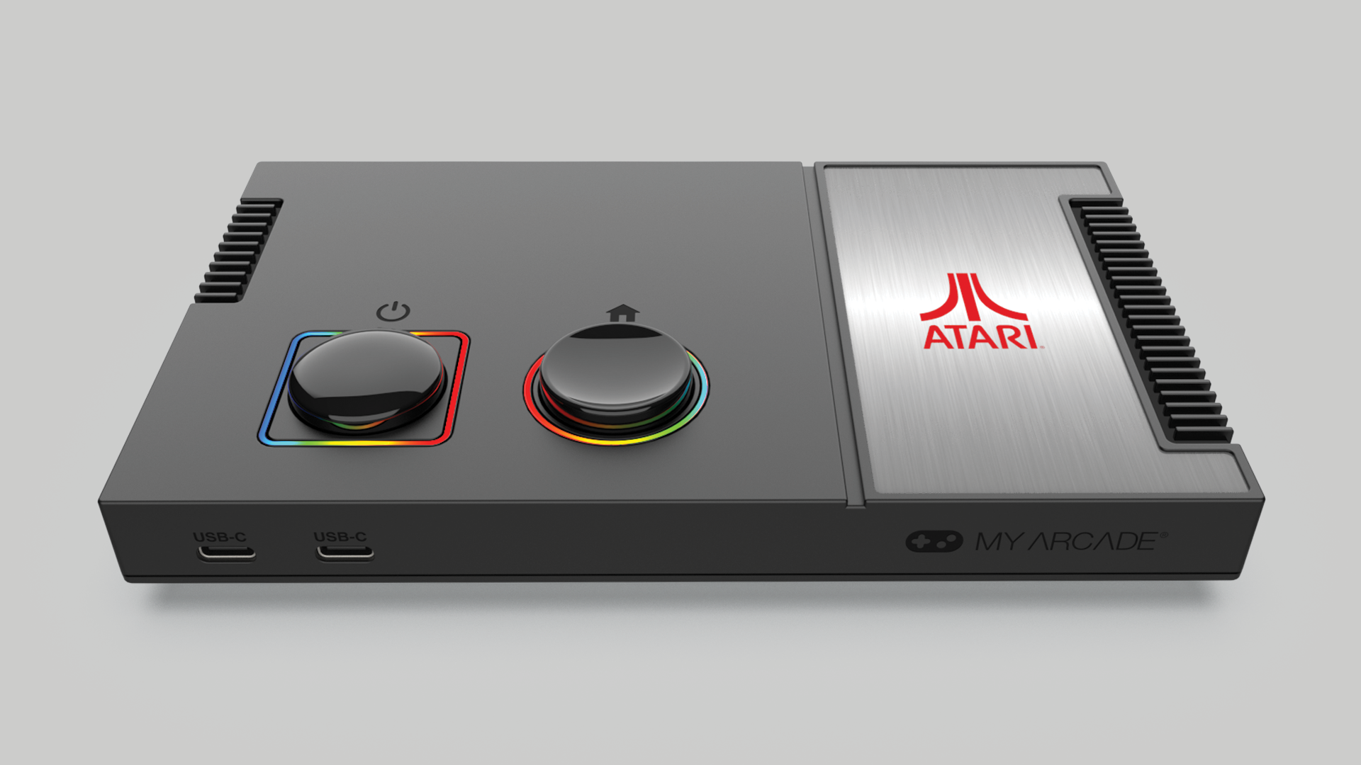 Kırmızı Atari logosu olan siyah ve gri oyun konsolu.