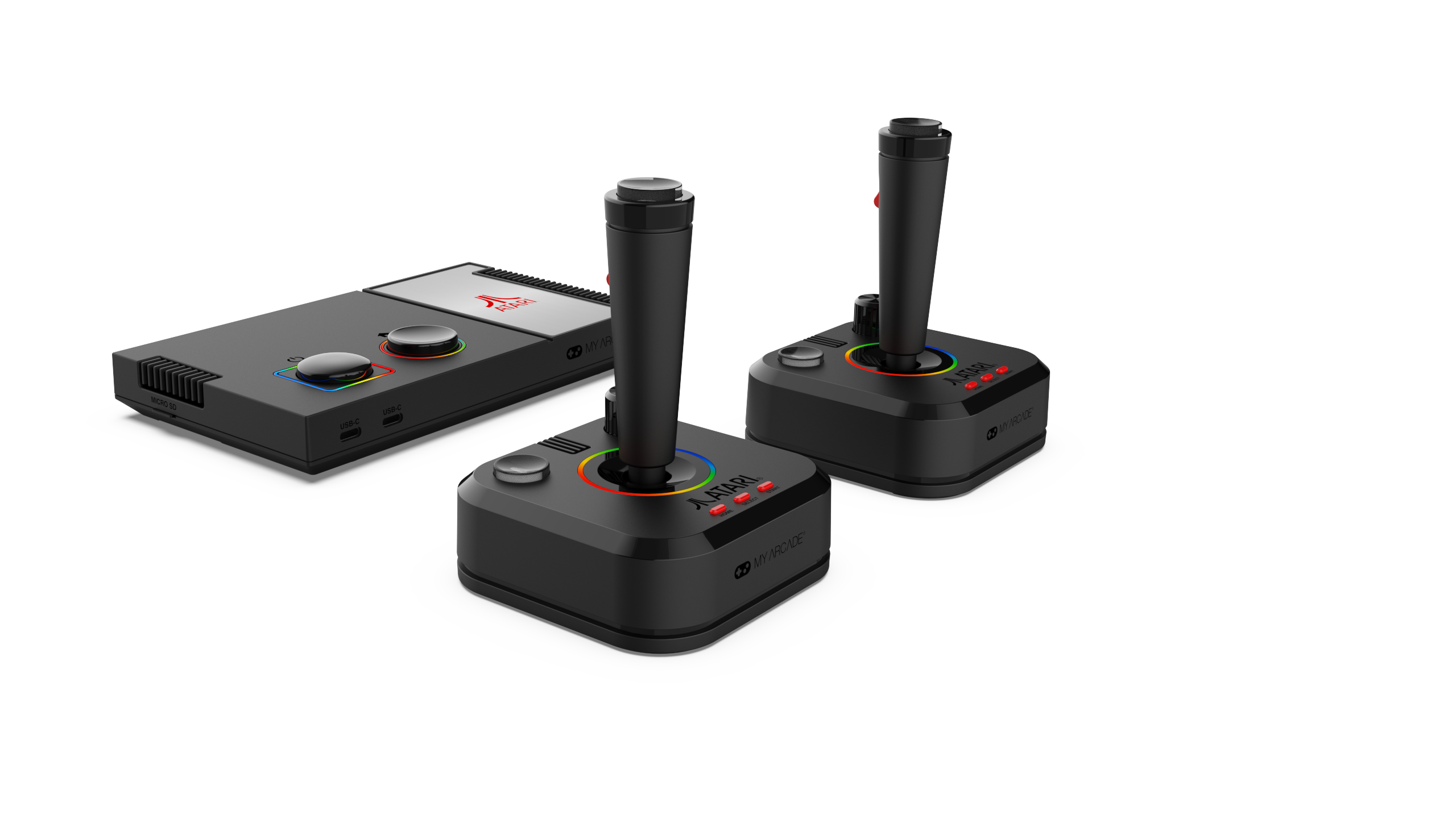 İki joystickli siyah Atari oyun konsolu, beyaz zemin.