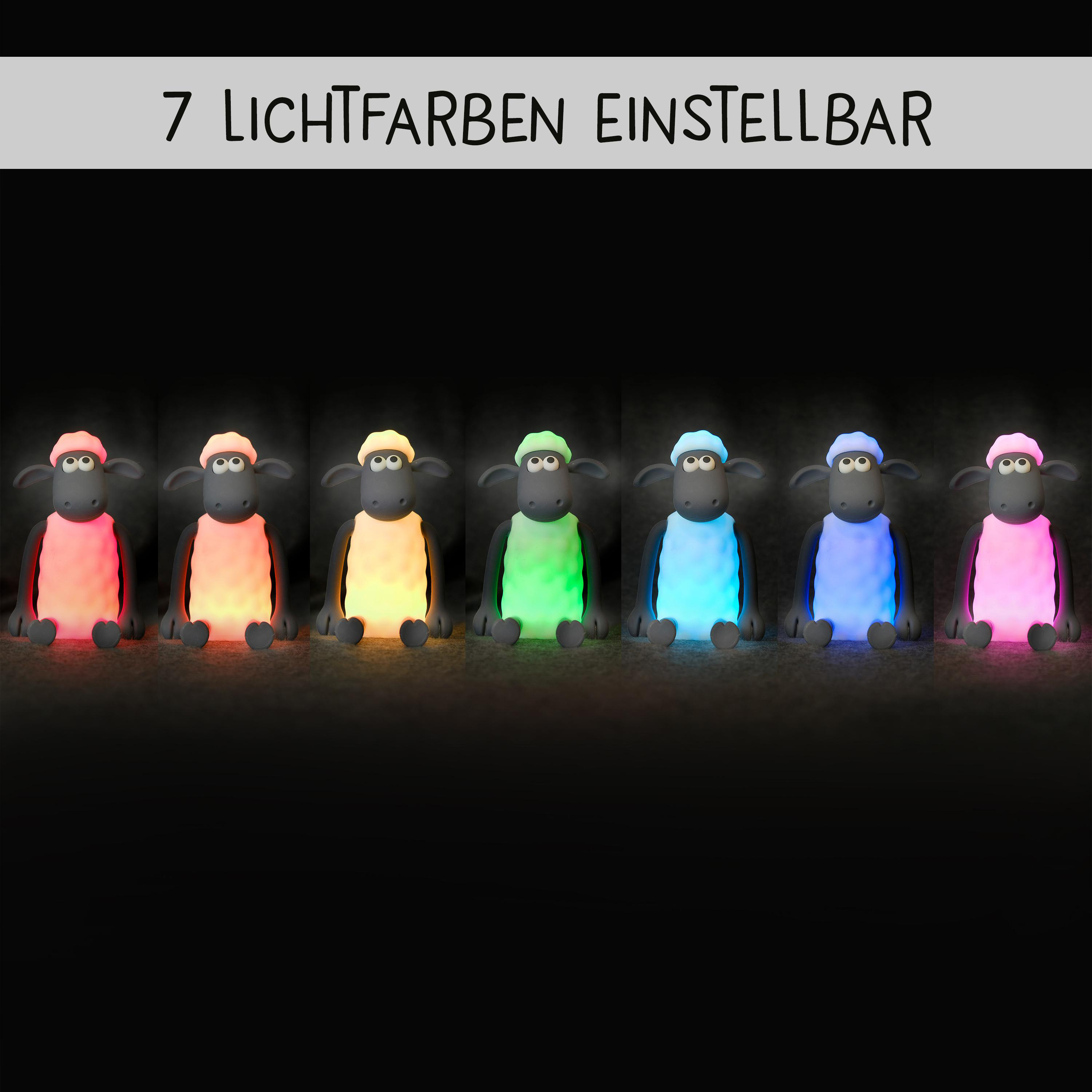 Sieben Schaf-Figuren mit unterschiedlich farbigen Lichtern, in einer Reihe angeordnet.