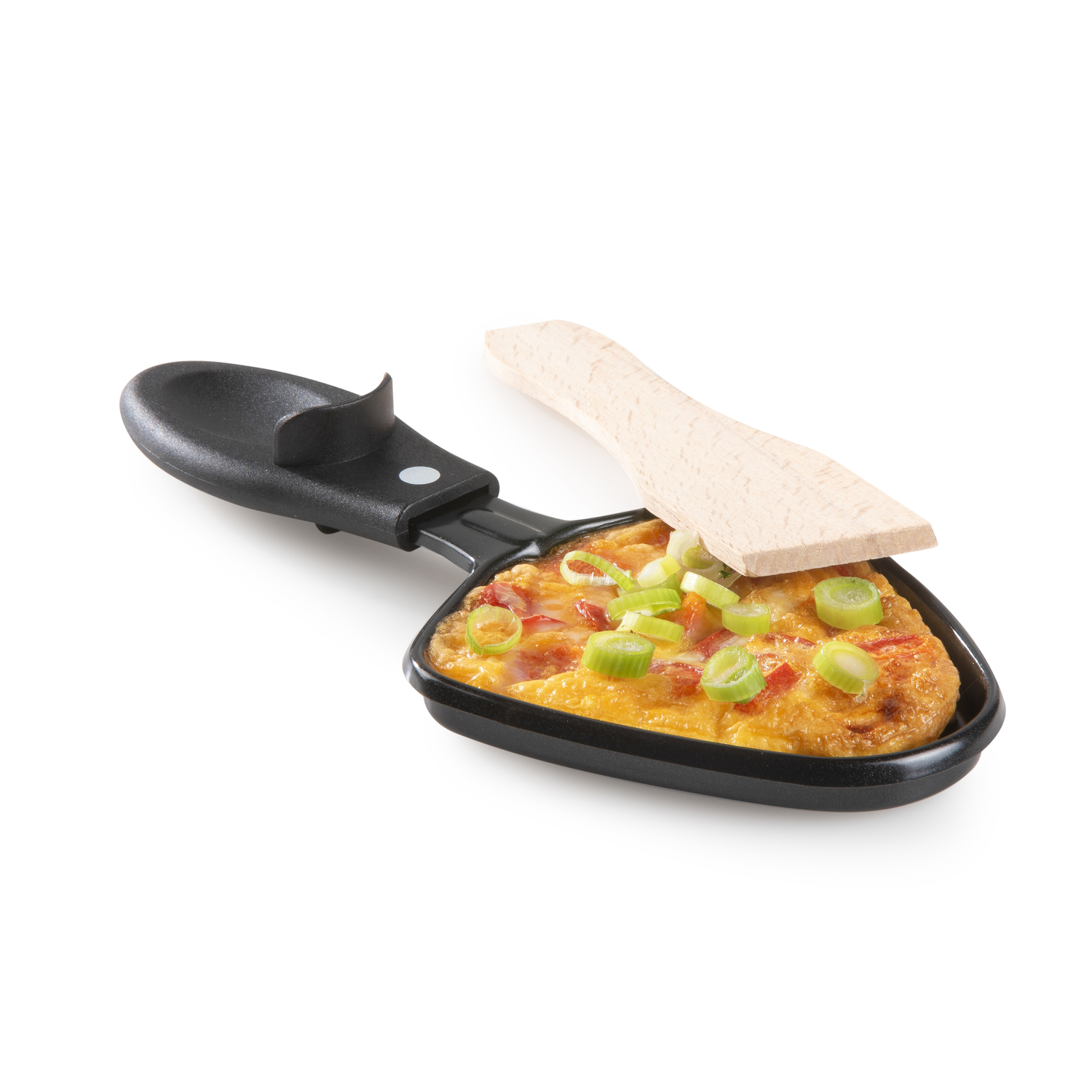 A single black raclette pan with cooked food and a wooden spatula. White background.