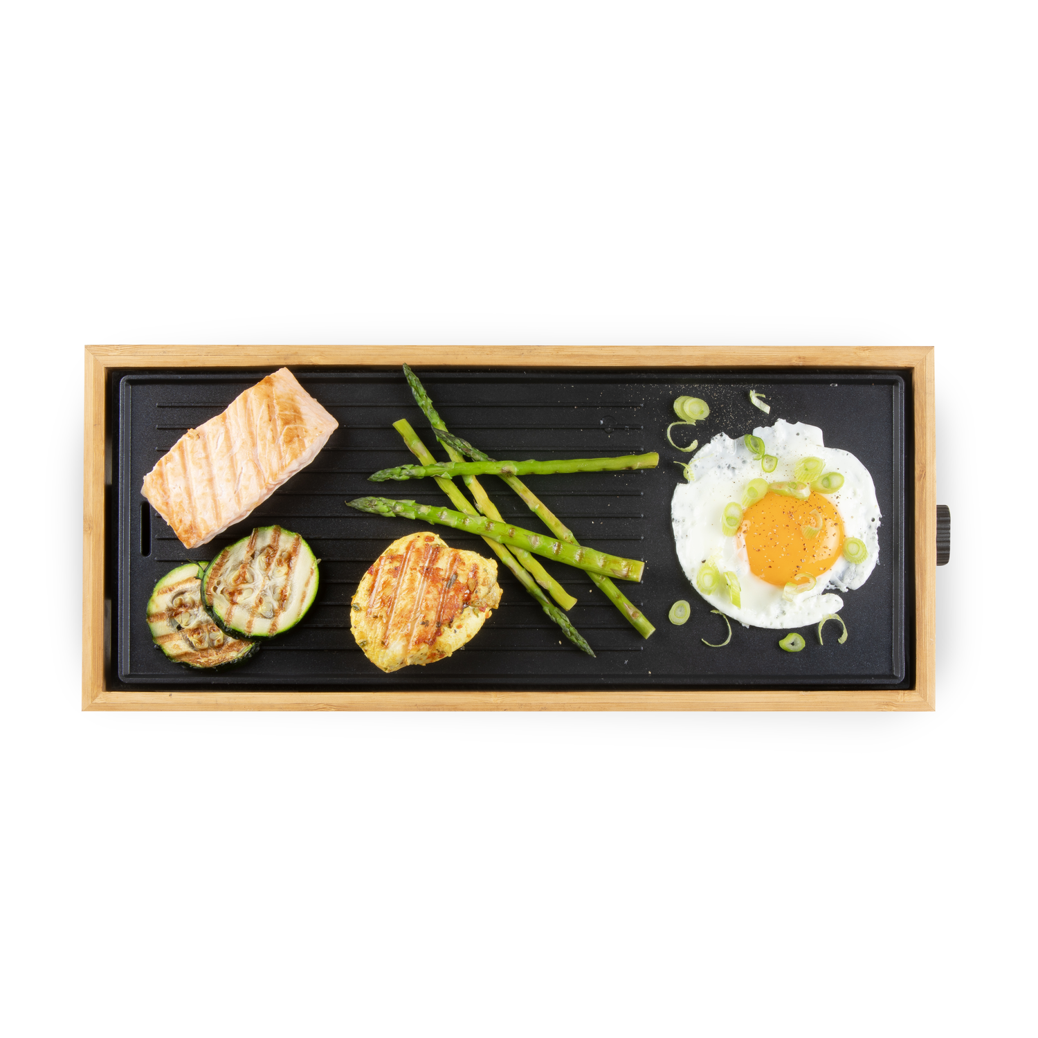 Grill with grilled food: salmon, zucchini, a patty, asparagus, and a fried egg.