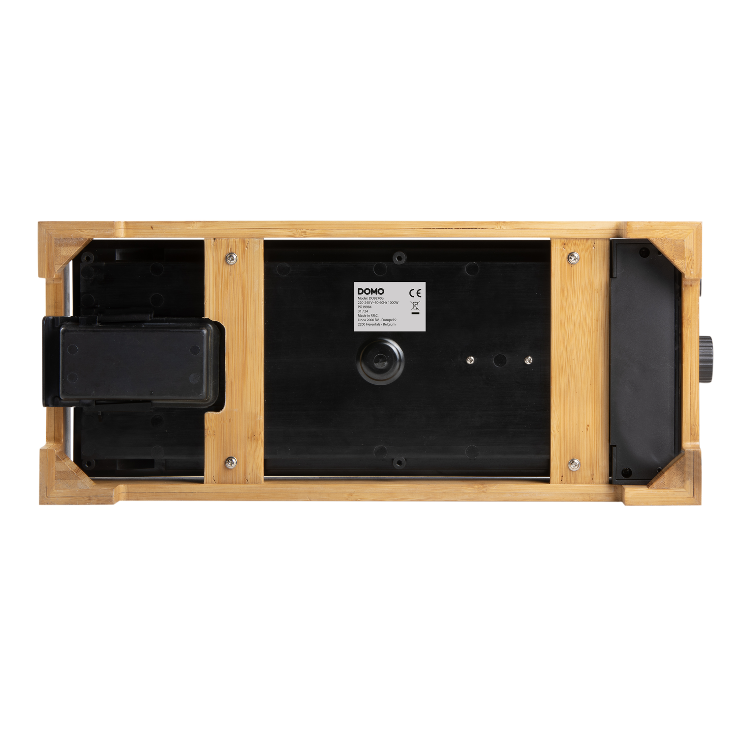 A wooden base for a raclette grill, with a black interior and details.