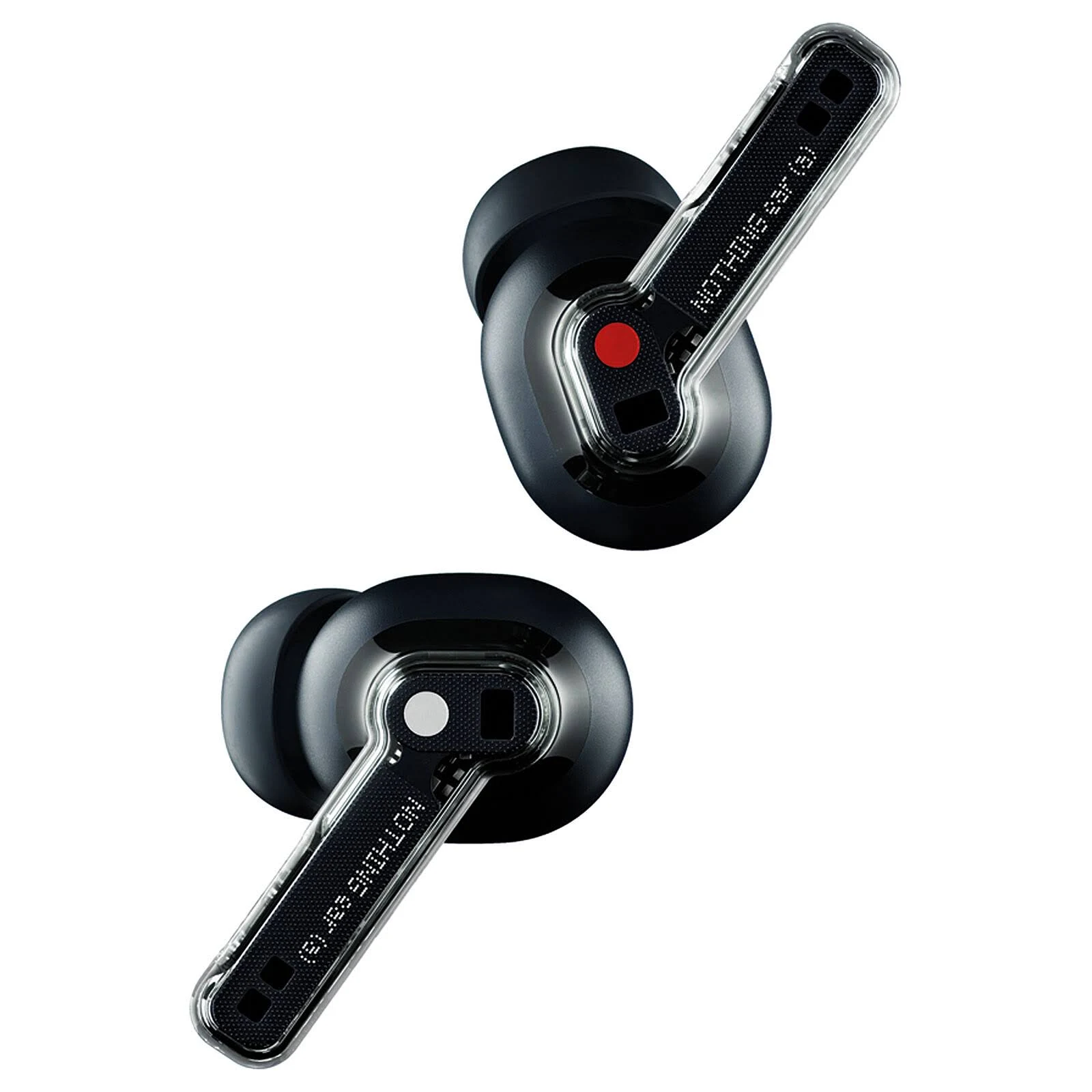 Dos auriculares negros Nothing ear (1), uno con punto rojo, otro con punto blanco, sobre fondo blanco.