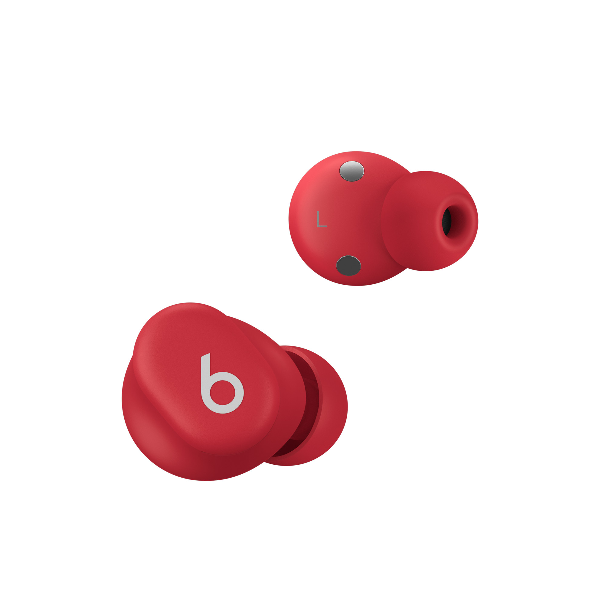 Beyaz küçük b logosunun görülebildiği iki kırmızı Beats kulaklık.