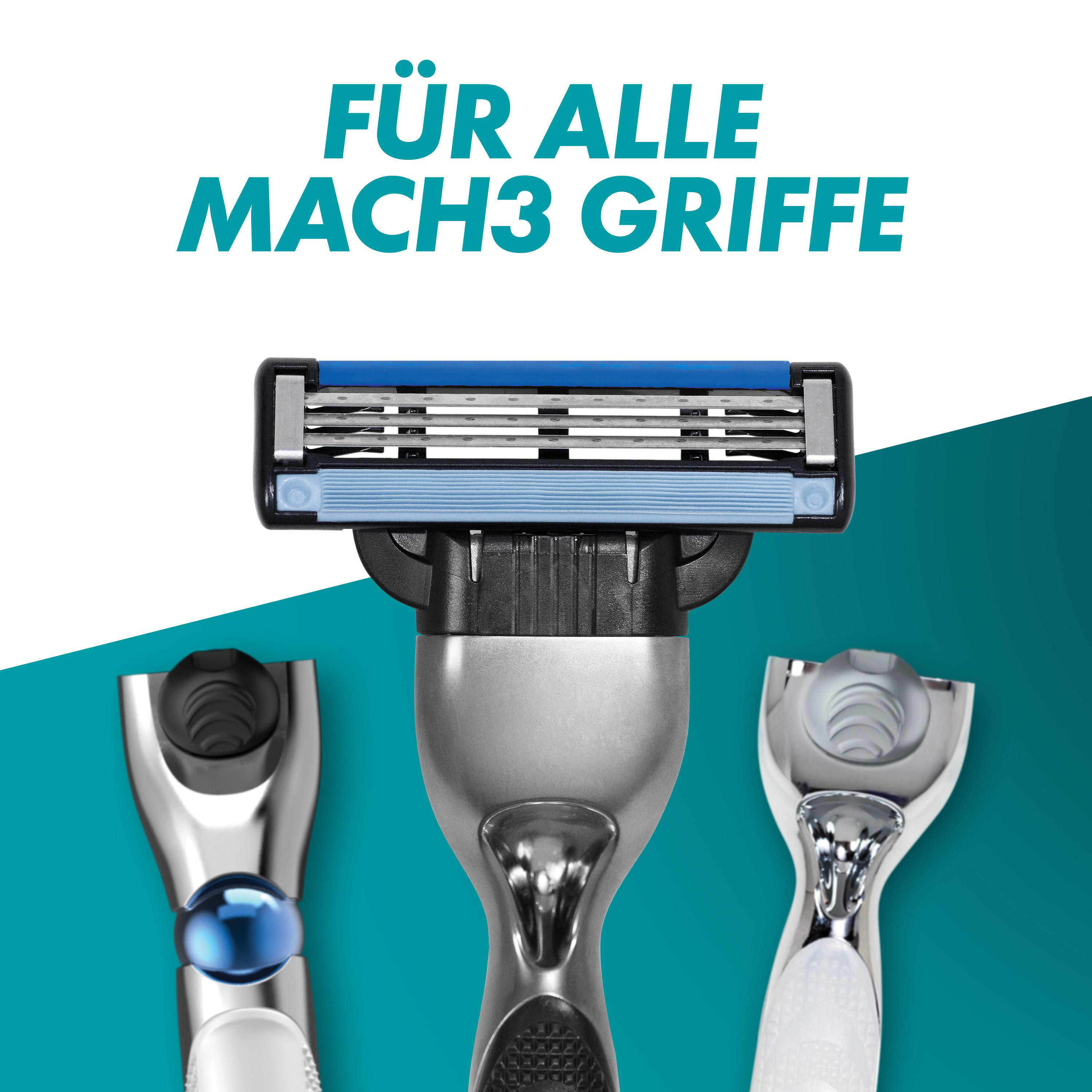 Drei Rasierergriffe, einer mit blauem Detail, Kartuschen sichtbar.