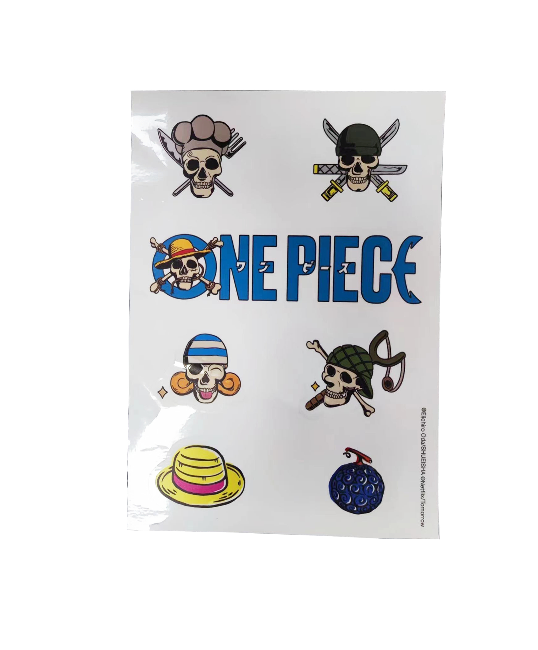 Blatt mit One Piece-Charakteren. Enthält Logos, Schädel, Schwerter und eine Teufelsfrucht.