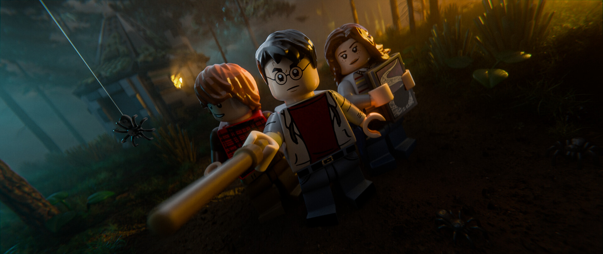 Lego Harry Potter figürleri: Harry, Ron ve Hermione, karanlık bir orman sahnesinde.