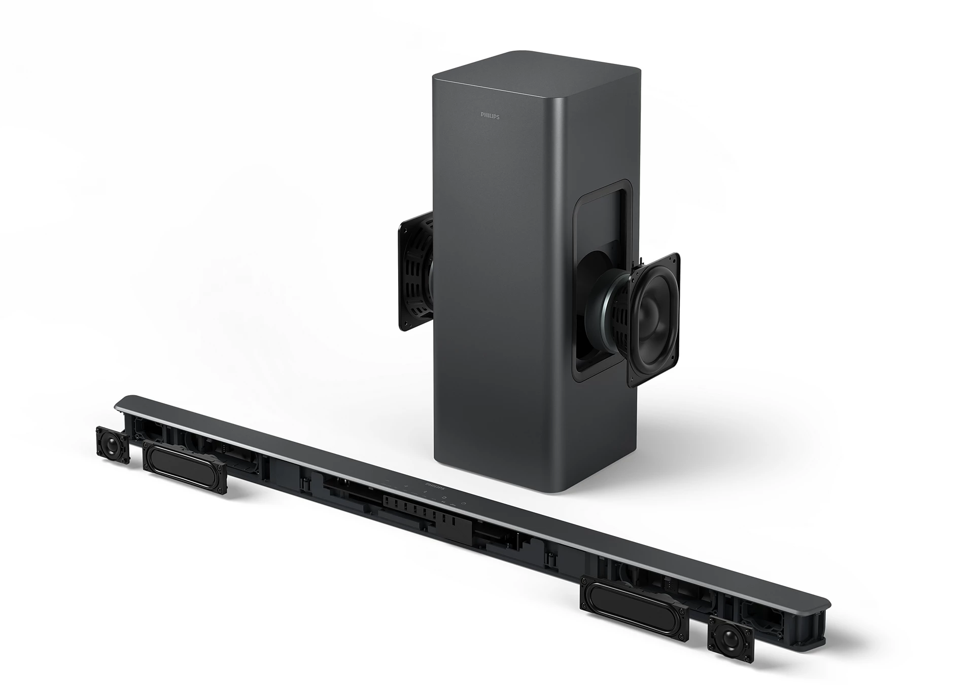 Configuración de barra de sonido y subwoofer Philips negros sobre fondo blanco. Altavoces visibles.
