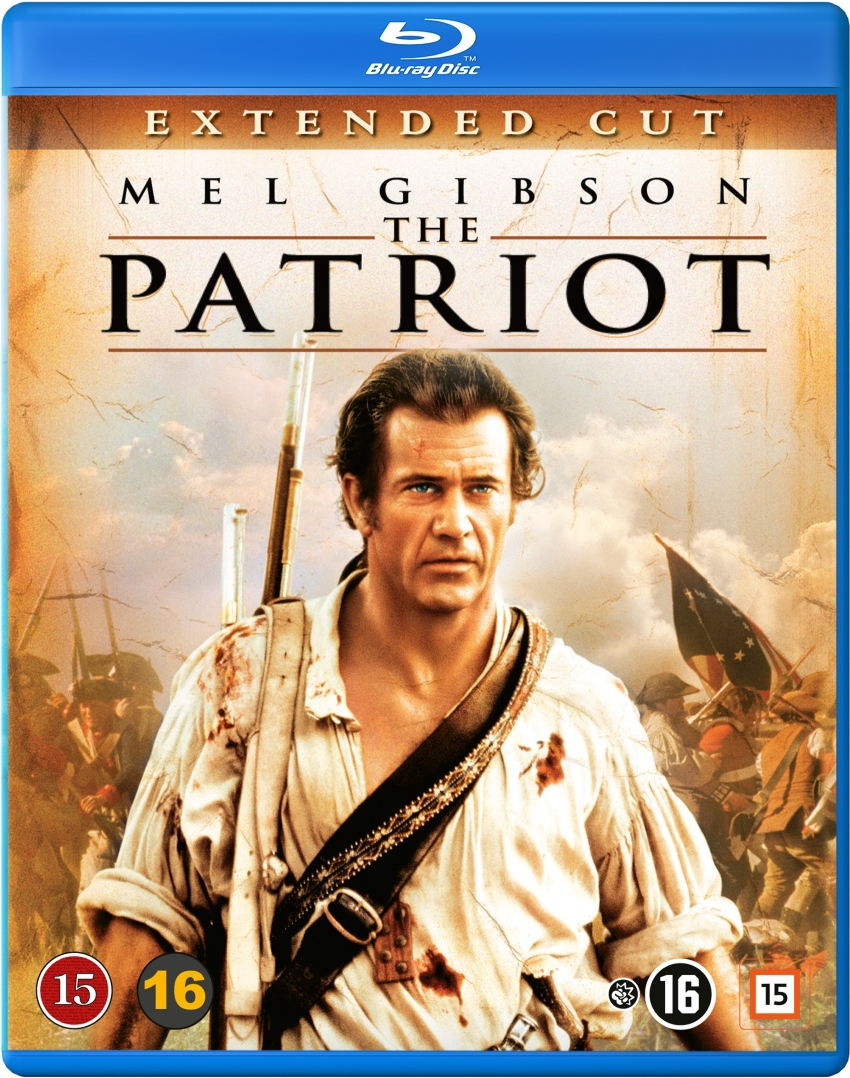 De Patriot DVD-hoes. Mel Gibson in een beige jas, met een geweer.