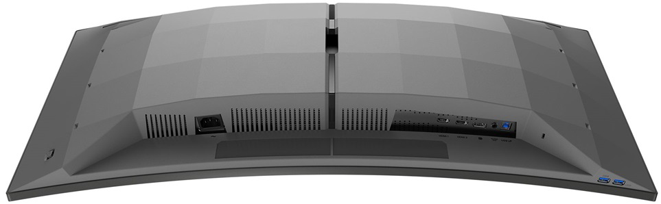 Ívelt monitor hátulnézete. Tartalmazza a tápellátás, a HDMI és az USB portokat, valamint a szellőzőnyílásokat. Szürke szín.
