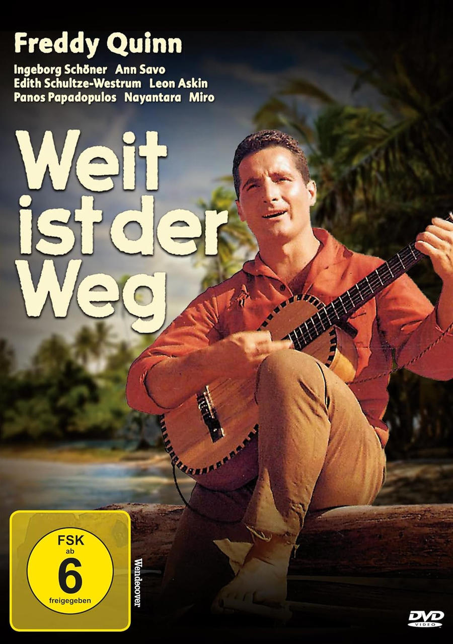 Mann spielt Ukulele am Strand. Oben steht der Titel 'Weit ist der Weg'.