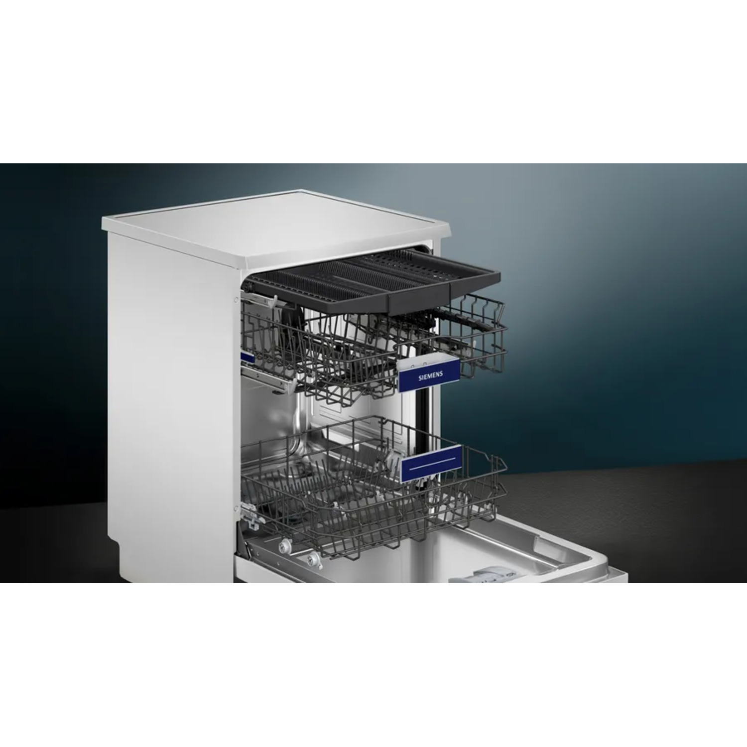 Dishwasher with open door, cutlery, glasses, plates, and Siemens logo.