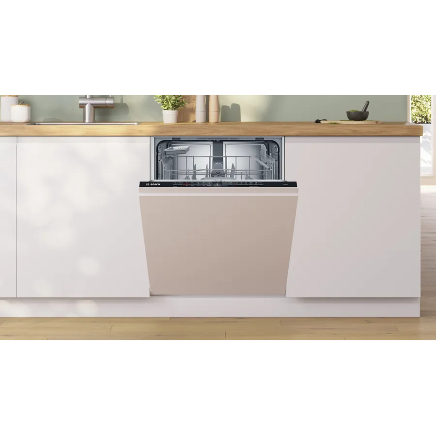 Dishwasher with open door. Beige panel, white cabinets on sides.