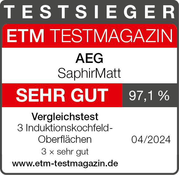 Ein Text mit den Wörtern „ETM Testmagazin“, „AEG“ und „Sehr Gut“ auf rotem und weißem Hintergrund.